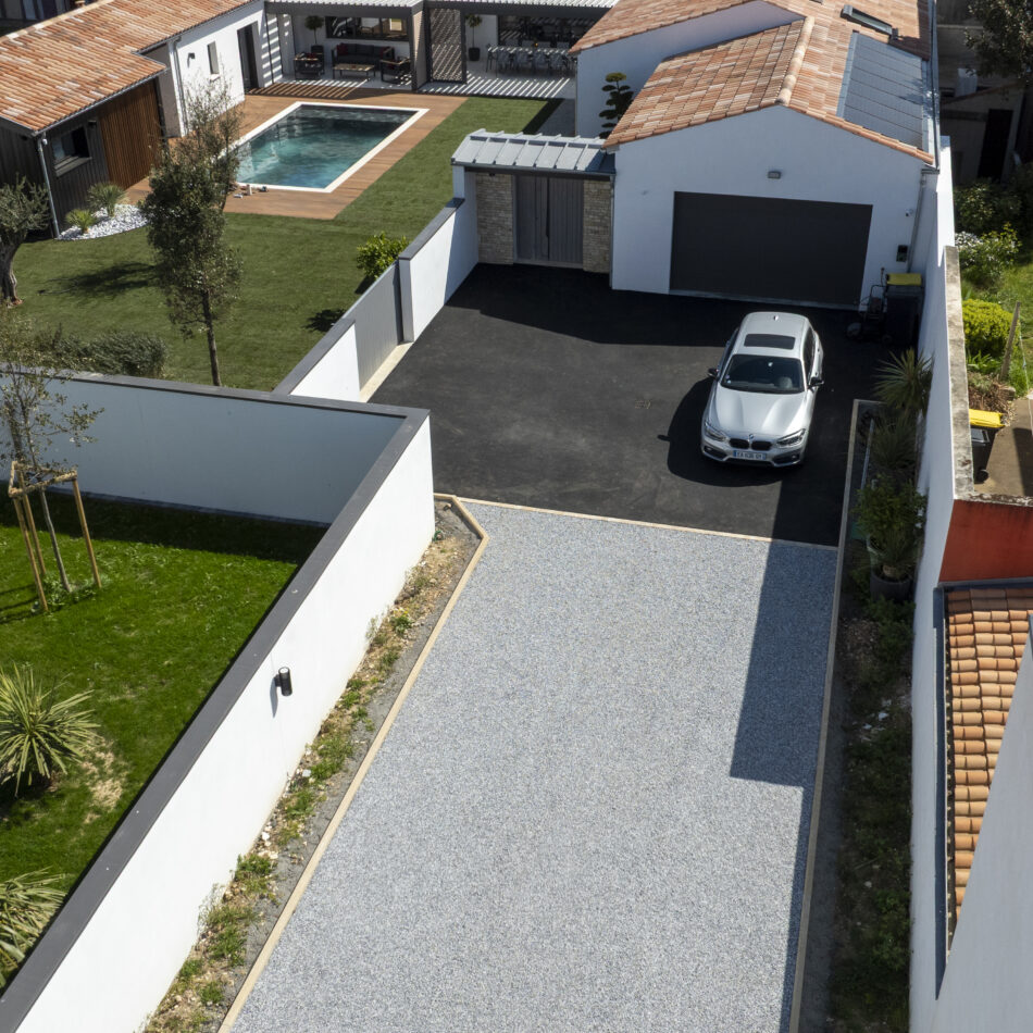 Allée enrobé noir et nigravel - Groupe Charpentier